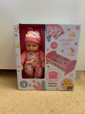 Baby Boo doll and cot 2 in 1